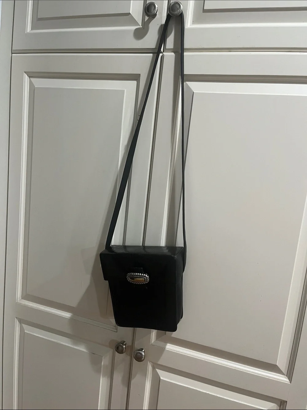 Brighton Compact Black Crossbody Bag with Decorative Silver Buckle